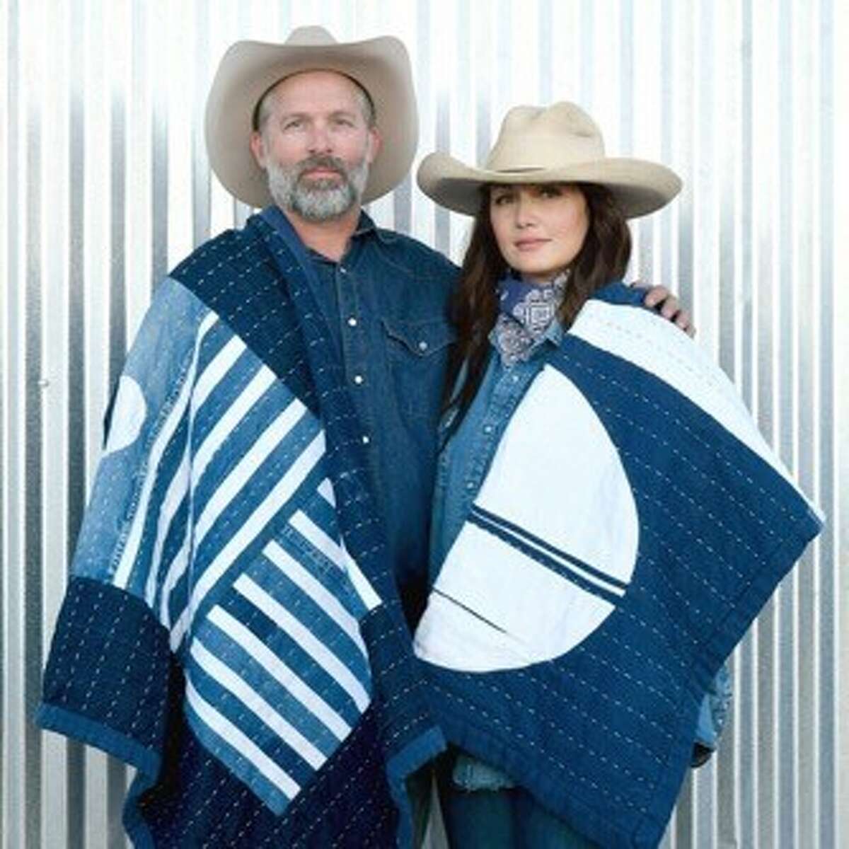 Eric and Jennie Herm are wrapped in denim blankets made from the cotton that is grown on their farm near Ackerly. The business currently is online only. The couple will be opening a shop in Marfa and have plans for shops in Houston and Santa Fe, N.M.
