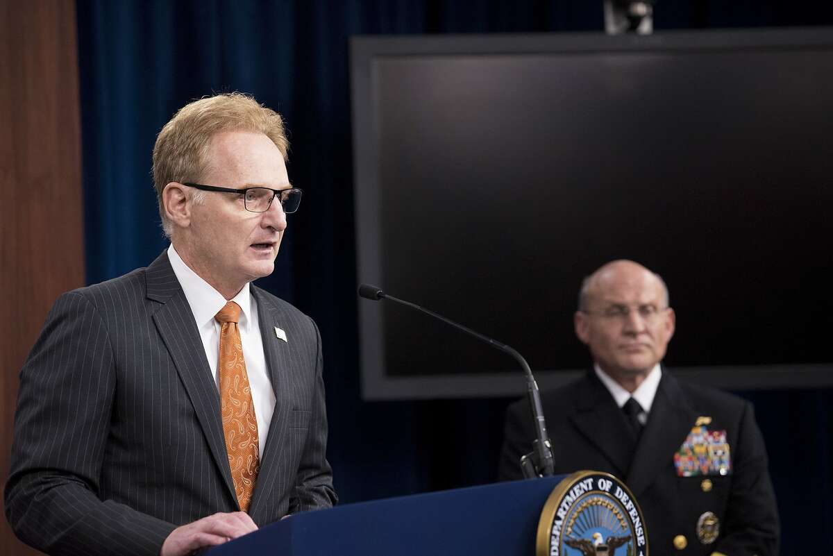 Acting Secretary of the Navy Thomas B. Modly, with Chief of Naval Operations Adm. Michael M. Gilday, announces the firing of Capt. Brett Crozier as commanding officer of the aircraft carrier Theodore Roosevelt at the Pentagon, Washington, D.C., April 2, 2020. (Lisa Ferdinando/Office of the Secretary of Defense/TNS)