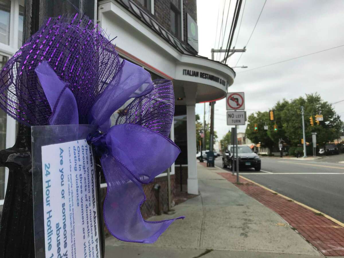 A blue ribbon brings attention to domestic violence. Experts share resources that are available for domestic violence victims during the pandemic.