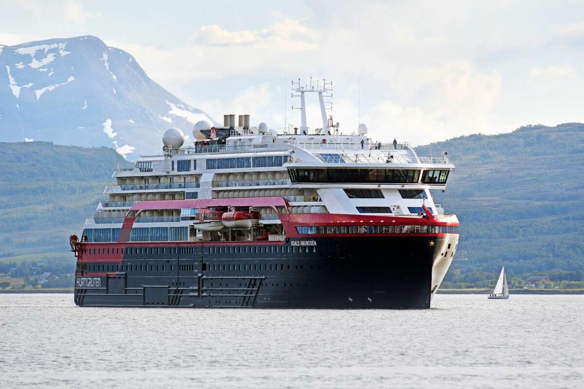 FILE - The MS Roald Amundsen cruise ship, the first of the new hybrid-powered expedition ships in Hurtigruten's fleet, arrives at Tromsoe, northern Norway on July 3, 2019.
