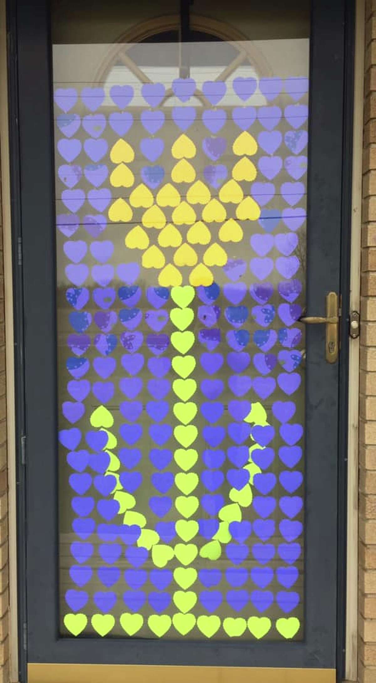 Inspired by the Facebook page #aworldofhearts, Public Arts Midland reached out to Midlanders, asking to see local window art they’re created while sheltering in place. (Photo Provided/Public Arts Midland)