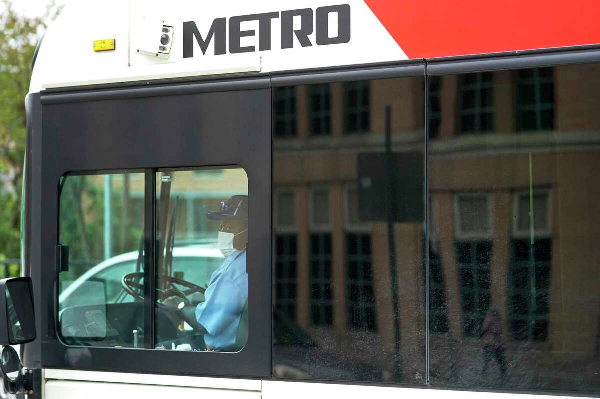 A Metropolitan Transit Authority bus driver is shown wearing a mask amid the coronavirus pandemic on April 6 in Houston.