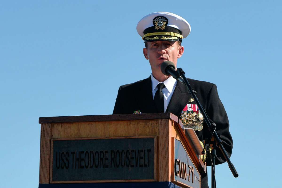 This handout photo released by the U.S. Navy shows Captain Brett Crozier addressing the crew for the first time as commanding officer of the aircraft carrier USS Theodore Roosevelt in San Diego, Calif., on Nov. 1, 2019.