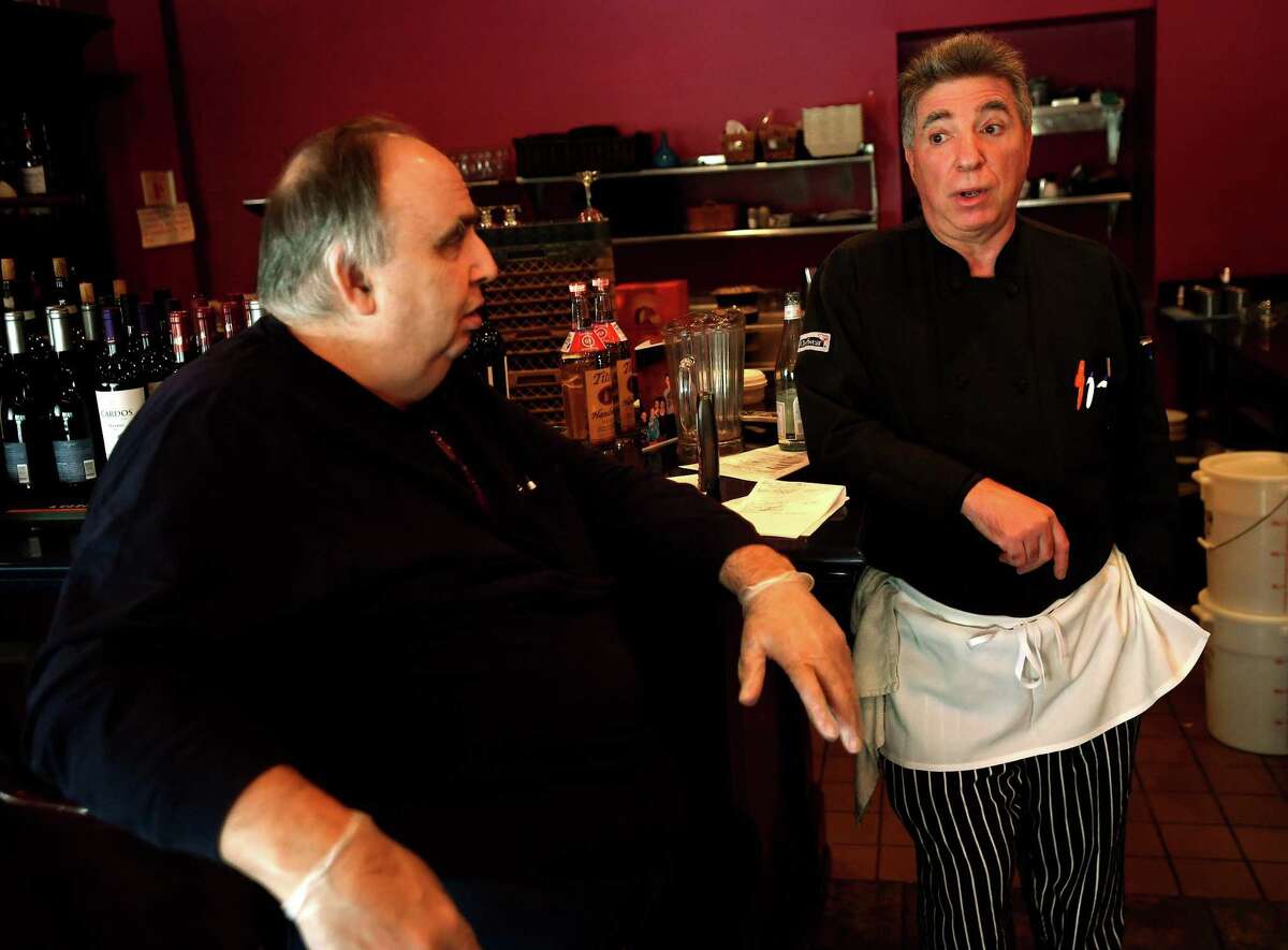 Owners Rich Ndini, left, and Ralph Solano chatted recently about their business at Ralph & Rich's restaurant in Bridgeport.