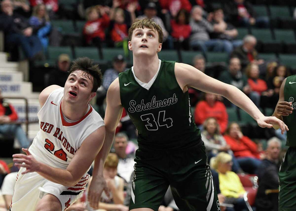 Schalmont's Shane O'Dell and Mechanicville's Luciano D'Ambro look on as a free throw rebounds during the Class B Sectional Final at Cool Insuring Arena in Glens Falls, N.Y., on Friday, Mar. 6, 2020. (Jenn March, Special to the Times Union)