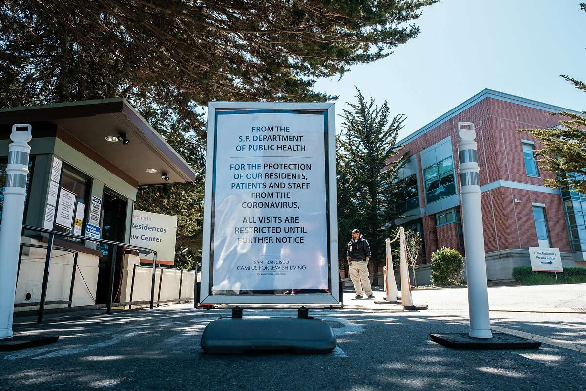 A Security guard stands out front of the San Francisco Campus for Jewish Living in San Francisco, Calif. on Thursday April 2, 2020.