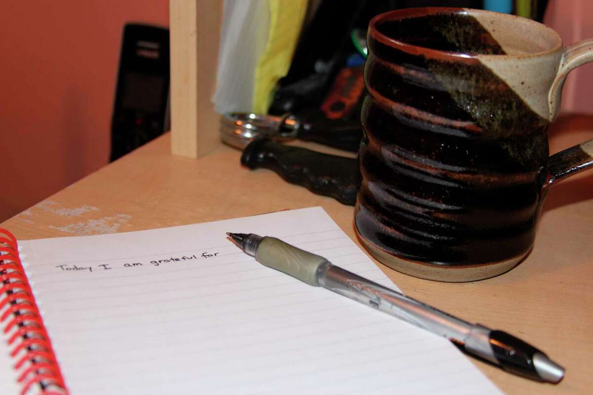 Writing in a journal is another way to help de-stress during the stay at home order. (Photo/Colin Merry)