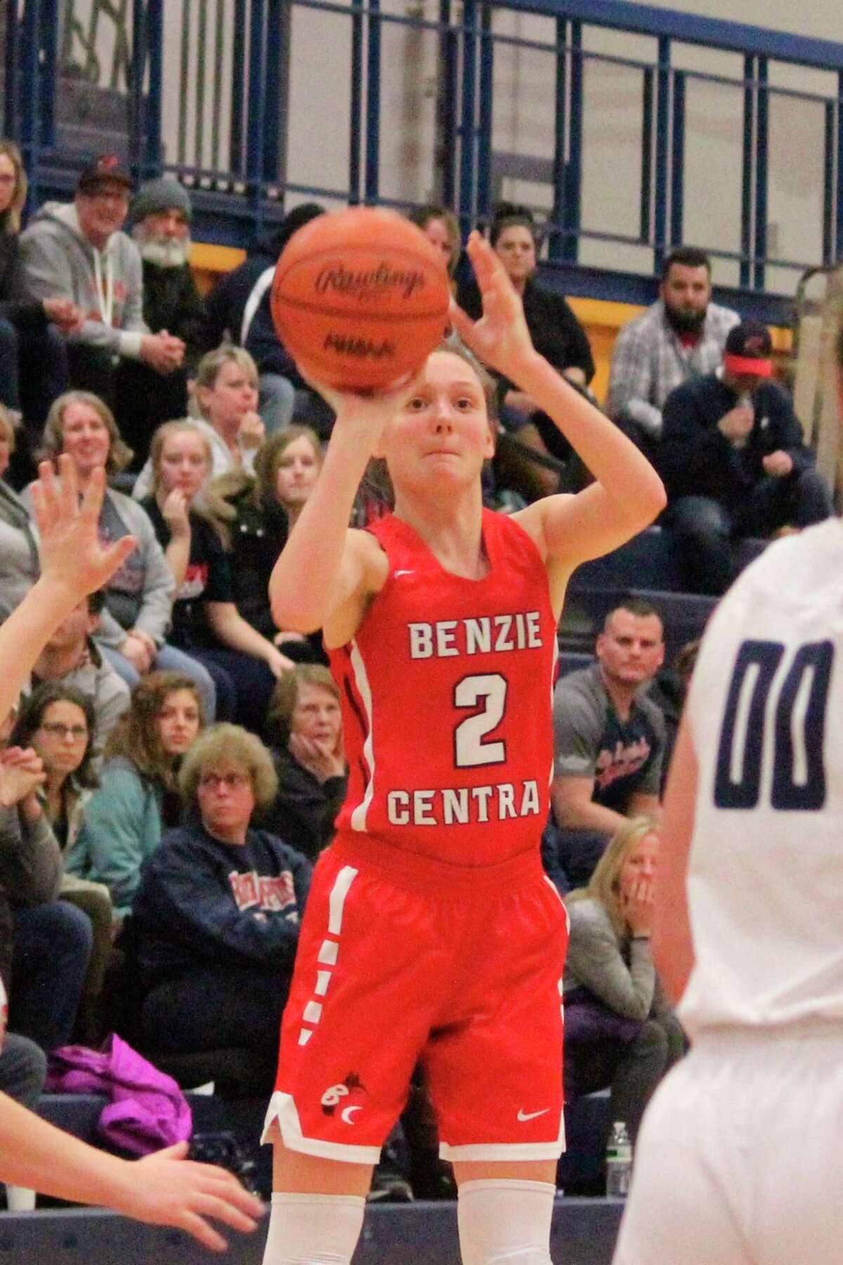 Ellen Bretzke fires a three-pointer as she tries to rally her team in districts. (File photo)
