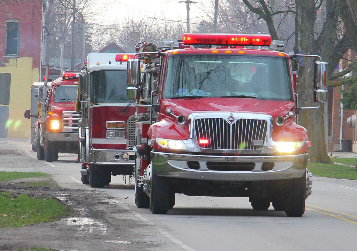 Emergency vehicles from the ACW-Unionville Fire Department drive by the home of Claire Van Tol on Tuesday evening to wish her a happy 14th birthday. The department has been conducting the parades to cheer up homebound kids during a challenging time.