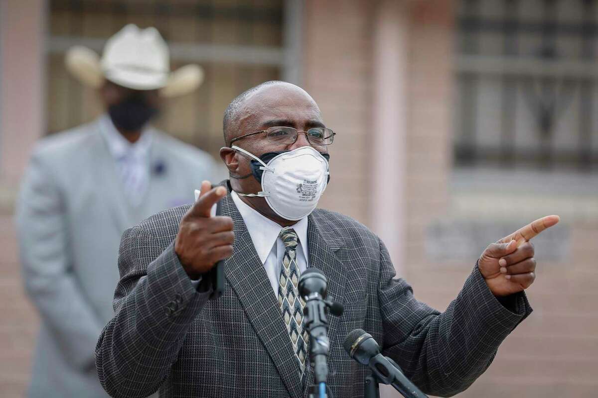 The Rev. Kenneth Rose along with Houston Mayor Sylvester Turner and other ministers to urge people to stay home for Easter during a press conference in the parking lot of Mount Hebron Missionary Baptist Church Wednesday, April 8, 2020, in Houston.