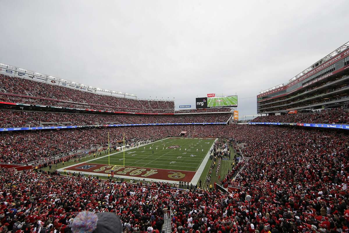FILE - In this Jan. 19, 2020, file photo, fans at Levi's Stadium watch as the Green Bay Packers kickoff to the San Francisco 49ers during the first half of the NFL NFC Championship football game in Santa Clara, Calif. (AP Photo/Jeff Chiu, File)