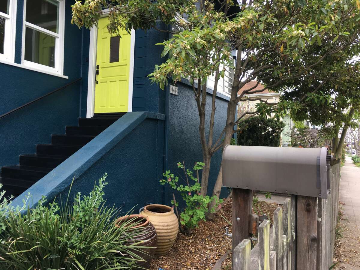 Seen here both with and without virtual staging is this Oakland Craftsman with chicken coop and yurt, asking $1.250M.