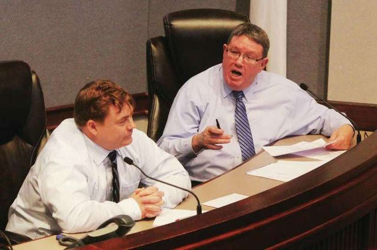 Madison County Auditor Rick Faccin, right, addresses Finance and Governmental Operations Committee Chairman Don Moore, R-Troy, during a meeting last year.