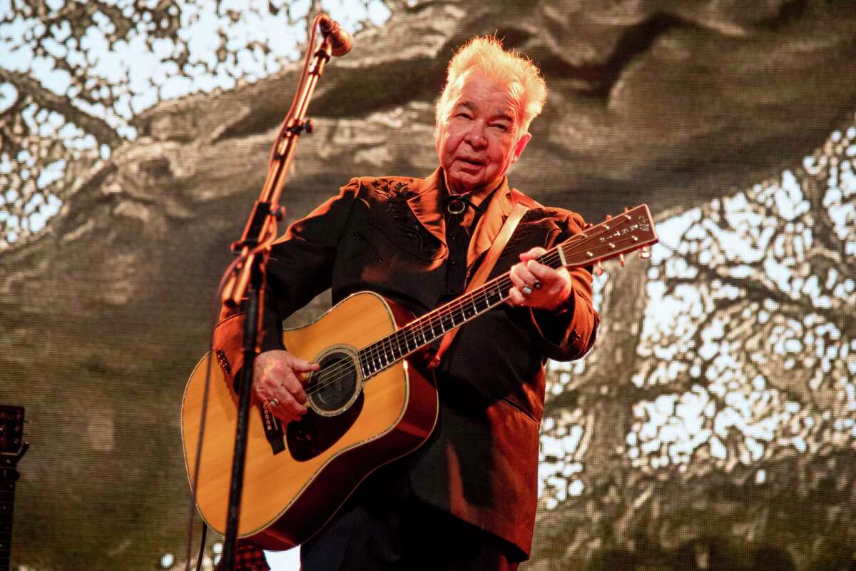 John Prine died Tuesday at 73 of complications from COVID-19. This June 15, 2019 file photo shows John Prine performing at the Bonnaroo Music and Arts Festival in Manchester, Tenn.