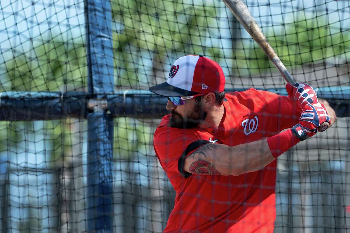 Adam Eaton of the Washington Nationals works on his swing at spring training. With no baseball going on right now, Eaton suggests using a tee and hitting a plastic ball into a net or a sheet.