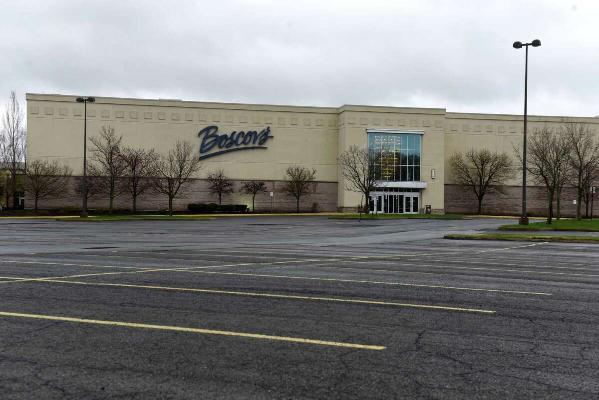 An empty parking lot is seen outside the Boscov's department store at Clifton Park Center shopping mall during the coronavirus lockdown on Thursday, April 9, 2020, in Clifton Park, N.Y. New York's jobless claims over the past three weeks now nearing 800,000. (Will Waldron/Times Union)