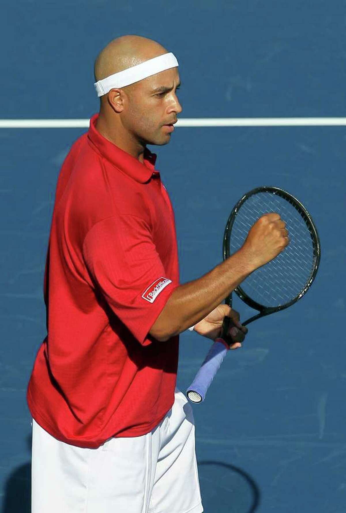 LOS ANGELES, CA - JULY 27: James Blake pumps his fist following his victory over Leonardo Mayer of Argentina during the Farmers Classic at the Los Angeles Tennis Center - UCLA on July 27, 2010 in Los Angeles, California. (Photo by Jeff Gross/Getty Images) *** Local Caption *** James Blake
