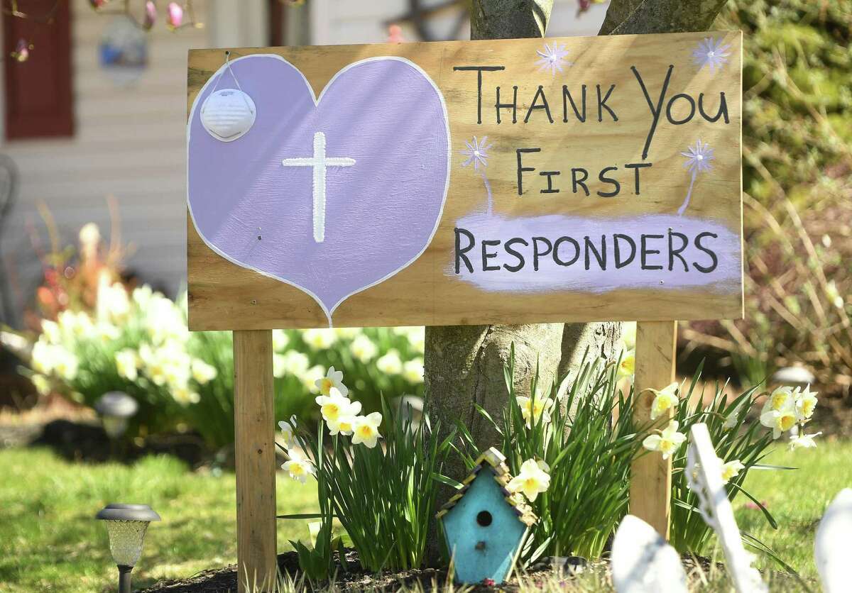 A sign thanks first responders in the wake of the coronavirus pandemic on Todd Drive in Milford, Conn. on Monday, April 6, 2020.