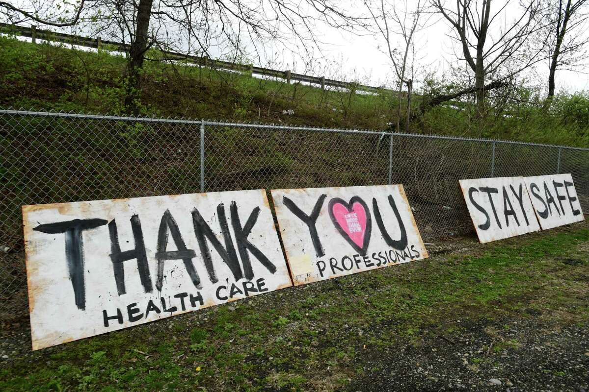 A sign on Route 1 thanks the workers at Norwalk Hospital Wednesday, April 8, 2020, in Norwalk, Conn.