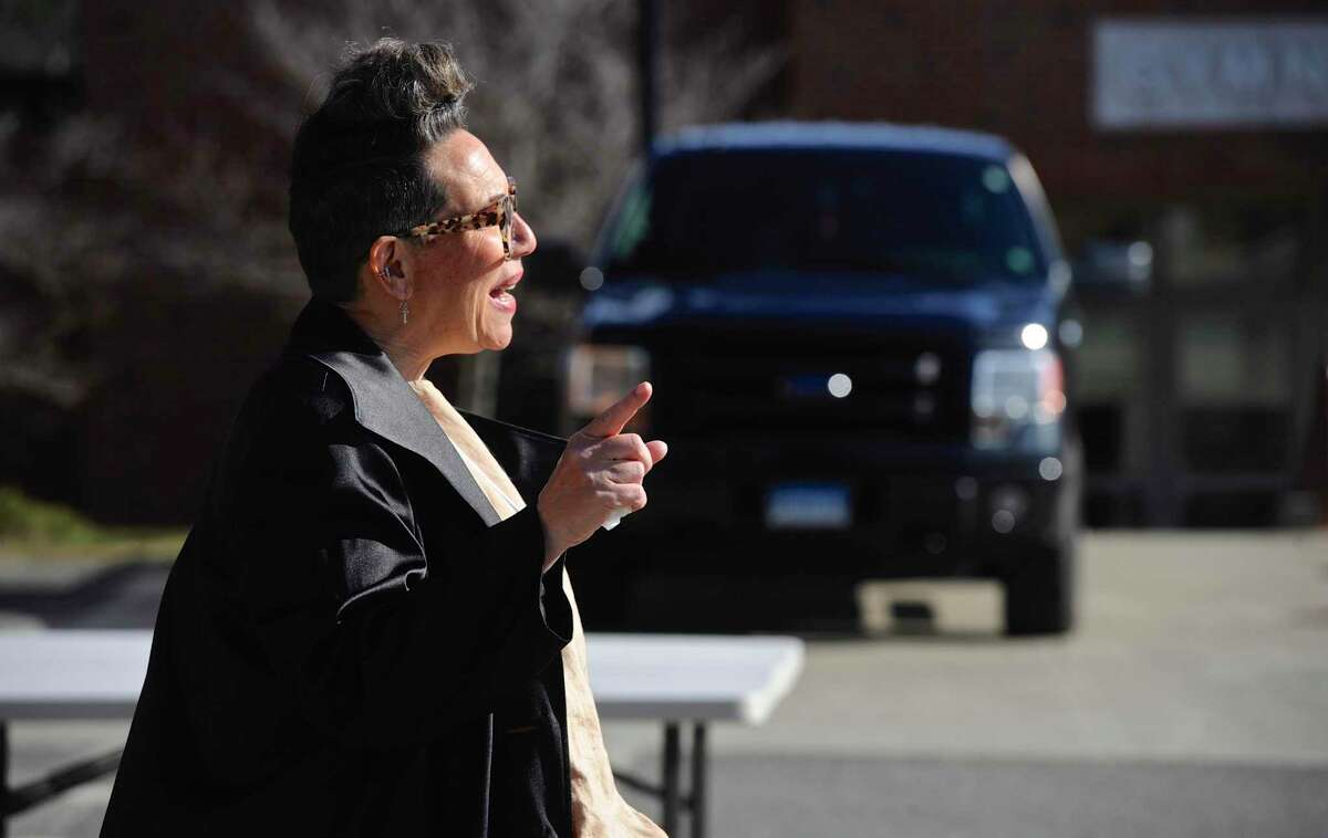 Amanda Riley, director of the Bethel school system food service is ready for another morning of what they are calling the COVID-19 Emergency Feeding Program. Lunch and breakfast bags were being distributed by the food service workers and volunteers at Berry School. Wednesday, April 1 2020, in Bethel, Conn.