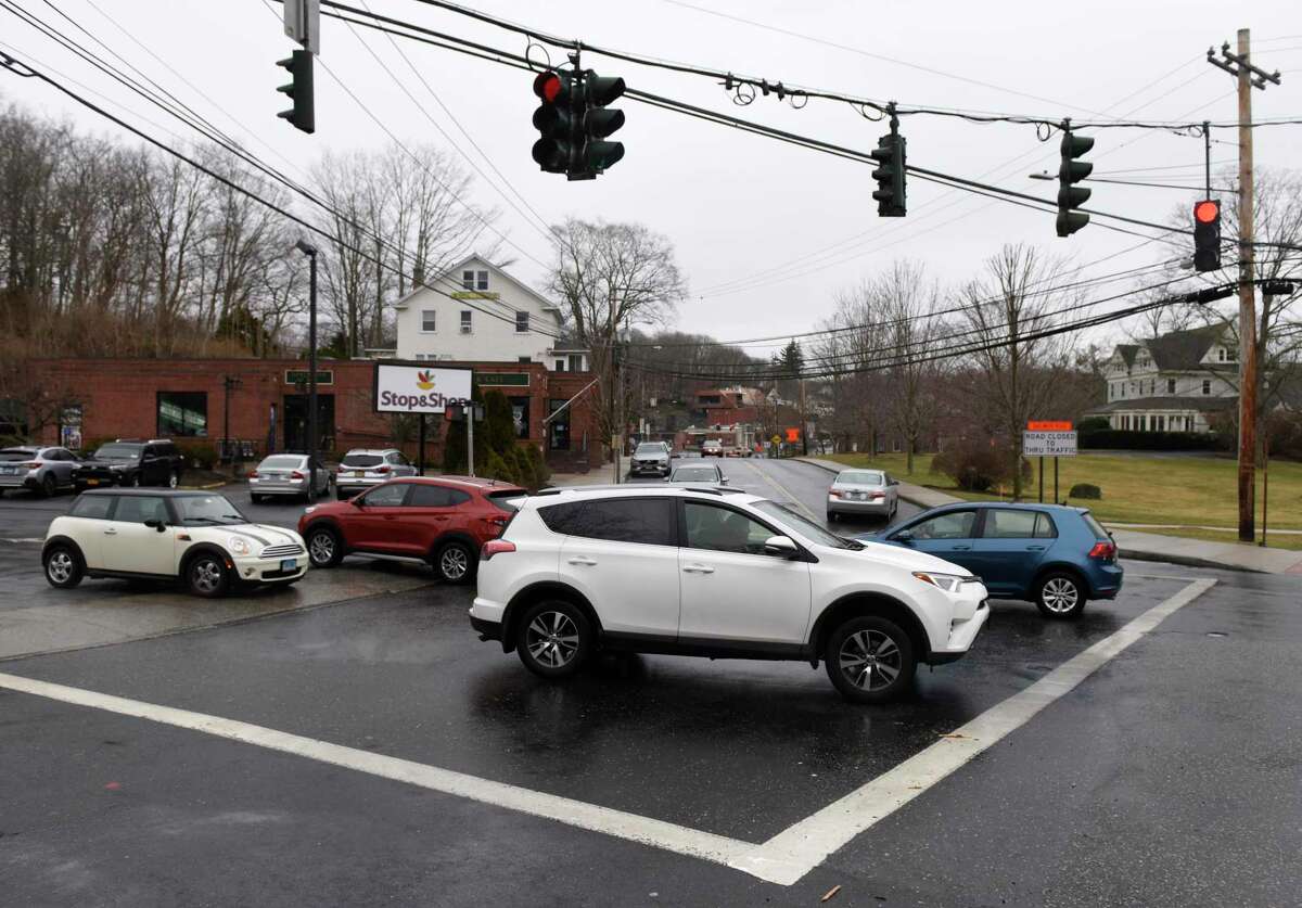 Traffic passes along Glenville Road near the intersection with Glen Ridge Road in the Glenville section of Greenwich, Conn. Thursday, March 21, 2019.