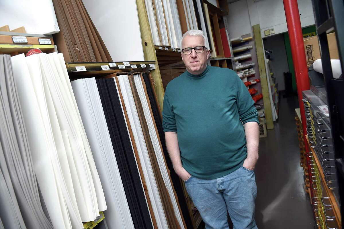 Shawn Szirbik, owner of Hull's Art Supply & Framing, is photographed in his store on Chapel Street in New Haven on April 10, 2020. The store received a waiver to reopen for art and architecture students who need supplies to finish projects before graduation.