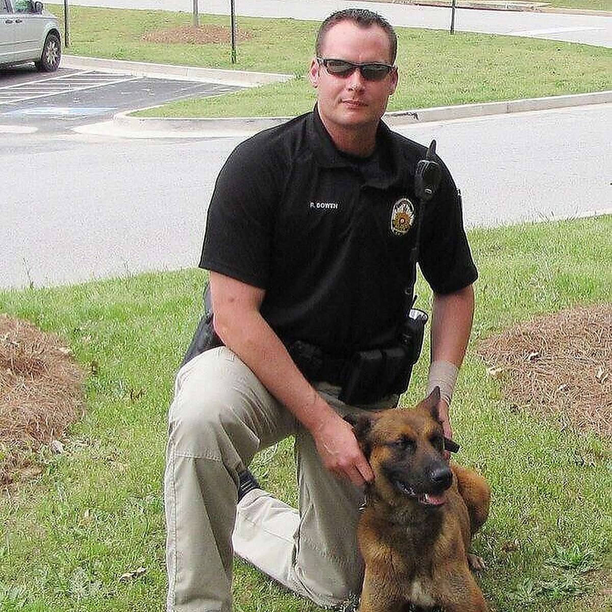 Former A's catcher Rob Bowen works with his first K9 partner, Jester, in Henry County, Ga.