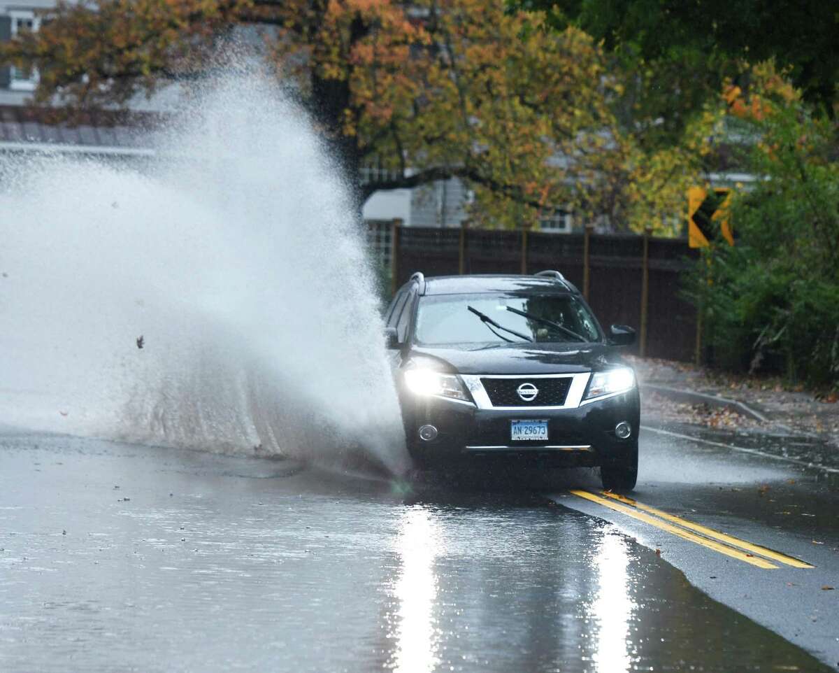 Rain and high winds are impacting roads and power lines in Wilton