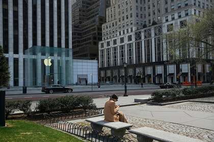 A park and street in New York are nearly deserted March 18, two days before the state ordered residents to shelter in place due to the coronavirus.