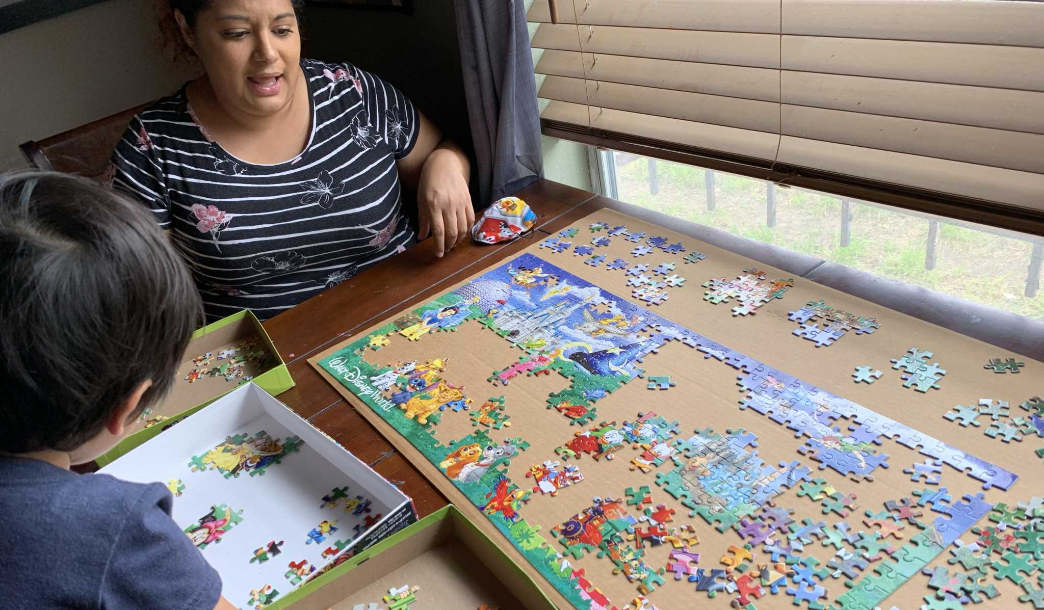 Jigsaw puzzles a welcome distraction for families during coronavirus ...