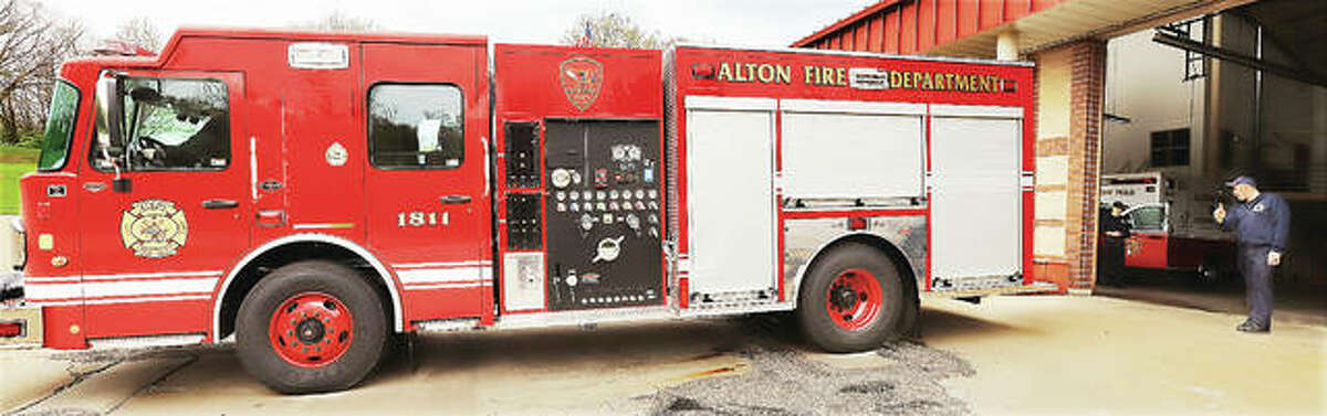 Alton’s first new fire truck in a decade backs into a bay at the Don Twichell Memorial Fire Station Monday. The mid-ship pump rescue/pumper can pump 1,500 gallons of water per minute.