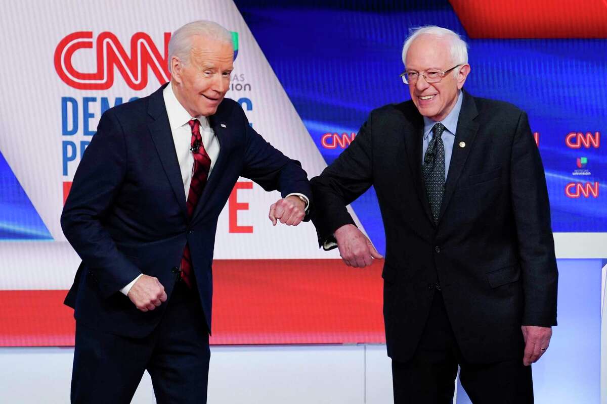 Joe Biden y Bernie Sanders en el debate demócrata el 15 de marzo del 2020 en Washington.