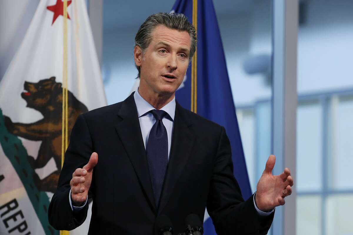 In this photo taken Thursday, April 9, 2020, Gov. Gavin Newsom gives his coronavirus update at the the Governor's Office of Emergency Services in Rancho Cordova, Calif. California public health officials said Friday, April 10, 2020, that the spread of the coronavirus in the state might not be as high as expected. Newsom said he was already making detailed plans on how to re-open the state while still stressing the need for people to say at home and stay away from others. (AP Photo/Rich Pedroncelli)