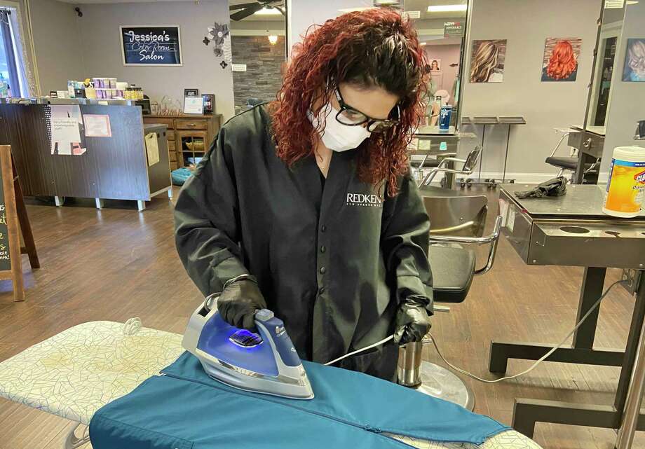 Jessica Sassu, owner of Jessica’s Color Room in Middletown, is doing the laundry of local first responders during the coronavirus pandemic. People can drop their work clothing at the salon and Sassu will wash, dry, iron and fold them that same day at no charge. Photo: Contributed Photo