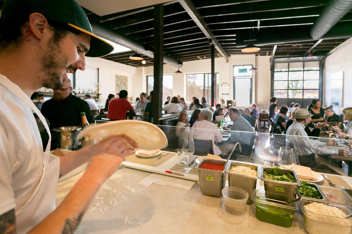 Dan Damone makes pizza at A16 restaurant in Oakland, Calif., on Wednesday, July 25th, 2013.