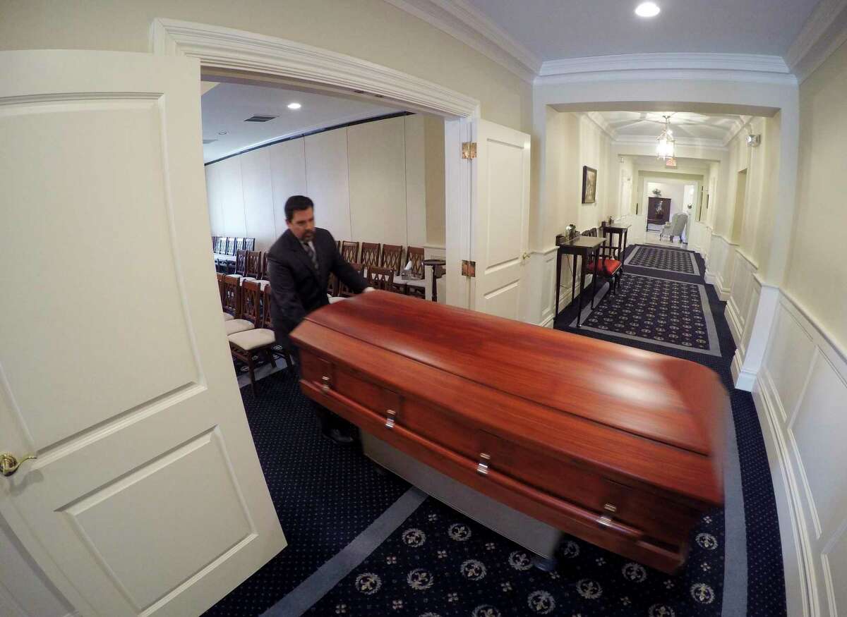 Funeral Homes Help Families Grieve In New, Confusing Coronavirus Reality