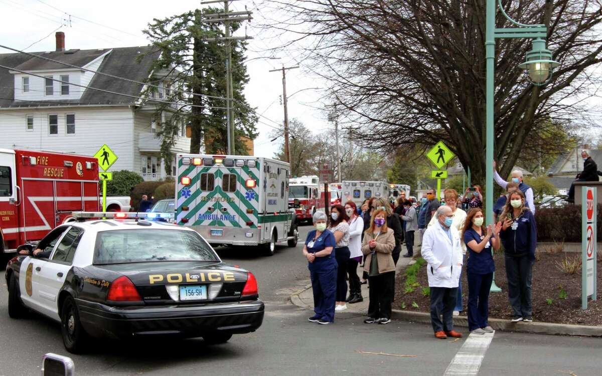 Griffin Hostpital health care workers were visited by dozens of valley fire, police, and EMS vehicles which drove past as a thank you for their work in Derby, Conn., on Tuesday Apr. 14, 2020. Vehicles gathered at Nolan Field in Ansonia and rode in a parade along Wakelee Ave and then stopped briefly at the hospital to greet workers.