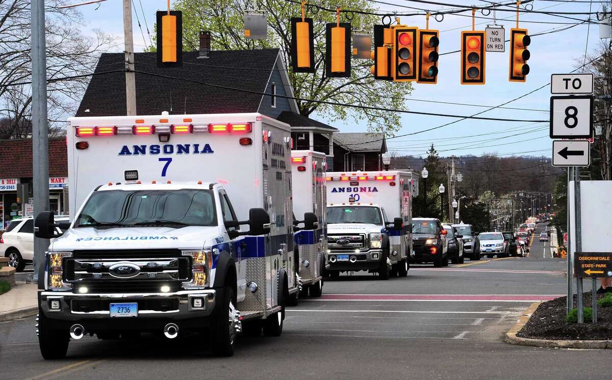 Griffin Hostpital health care workers were visited by dozens of valley fire, police, and EMS vehicles which drove past as a thank you for their work in Derby, Conn., on Tuesday Apr. 14, 2020. Vehicles gathered at Nolan Field in Ansonia and rode in a parade along Wakelee Ave and then stopped briefly at the hospital to greet workers.