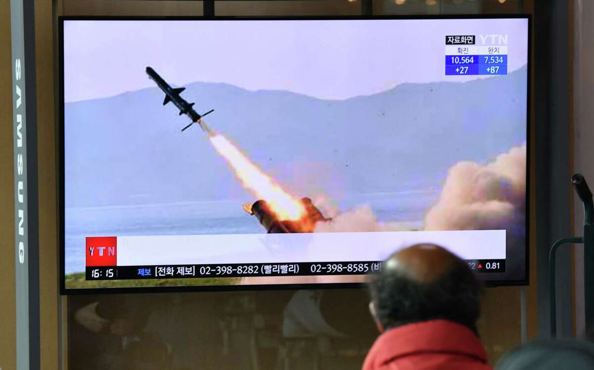 (FILES) In this file photo taken on April 14, 2020 a man watches a television news broadcast showing file footage of a North Korean missile test, at a railway station in Seoul, - The US military's top general played down North Korea's fresh batch of suspected missile launches on April 14, 2020, saying the Pentagon did not see them as threatening. "These were short range. These aren't any particularly big, big missiles," Joint Chiefs of Staff Chairman Mark Milley said. (Photo by Jung Yeon-je / AFP) (Photo by JUNG YEON-JE/AFP via Getty Images)