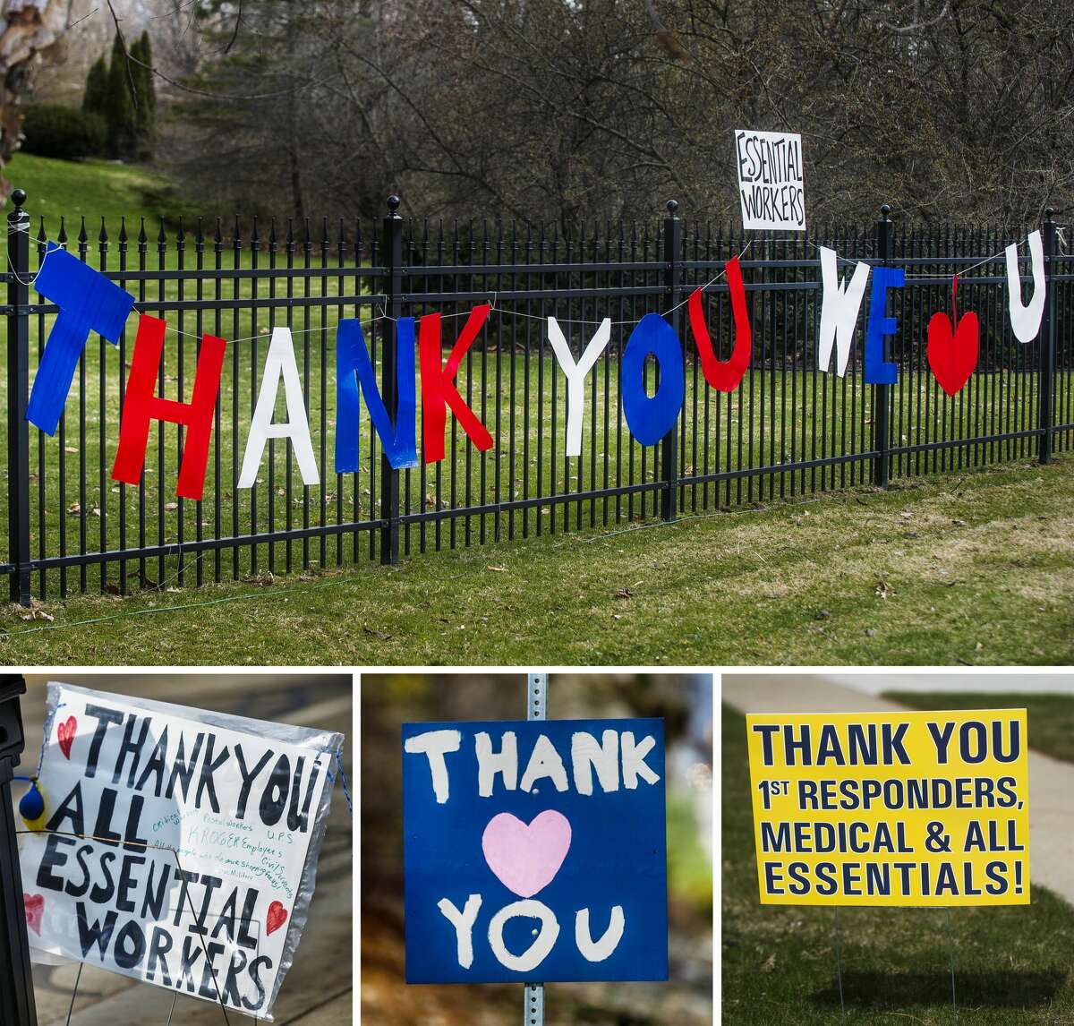 Signs thanking essential workers are displayed Wednesday, April 15, 2020 outside of homes along Sugnet Road, where hospital employees may see them on their way to work. (Katy Kildee/kkildee@mdn.net)