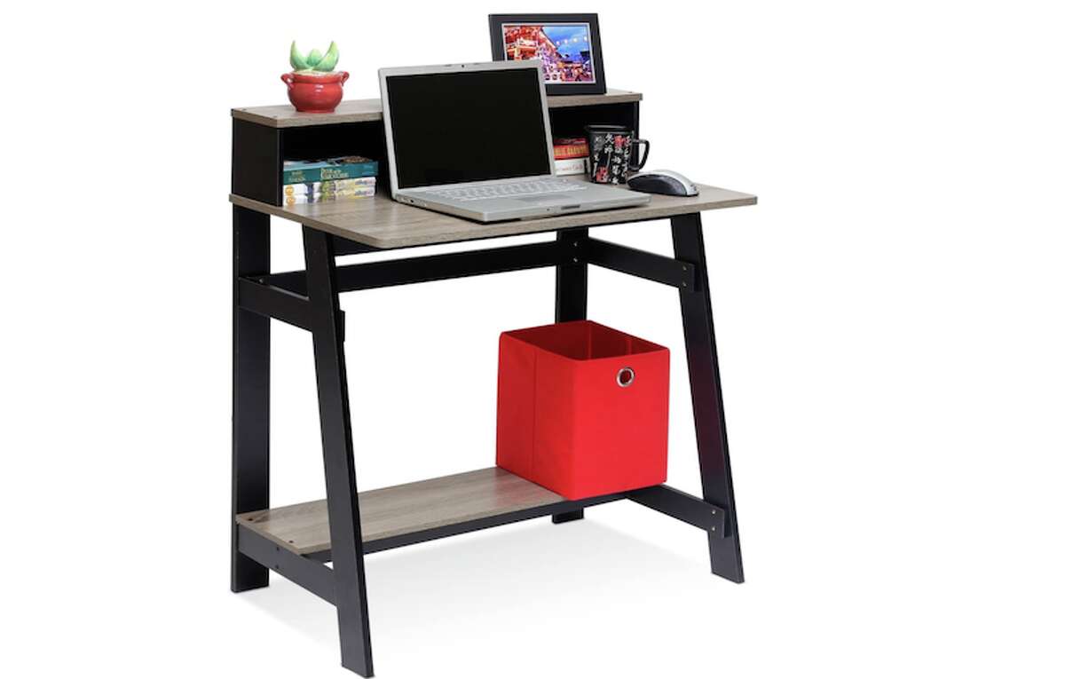 Furinno Simplistic A Frame Computer Desk, $36.59If you have a tiny apartment and need a desk that's also tiny in price, look no further than the Furinno Simplistic A Frame Computer Desk. It has enough room for your laptop, a picture frame, a few knick-knacks, pens, and even under-the-desk storage.
