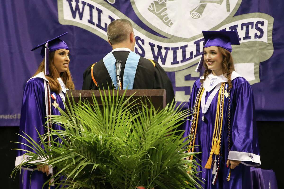 Laura Navarro, Student Body President, and Emalee Hoffmann, Senior Class President, present the Senior Class Review during the Willis High School commencement ceremony on Friday, May 26, 2017, at Sam Houston State University.