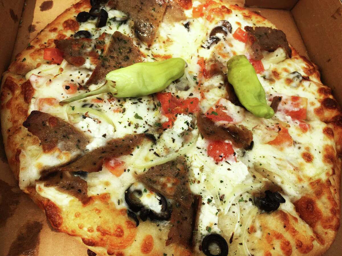 The Greek pizza at Rami's Pizza features gyro meat, black olives, feta cheese, onions and tomatoes.
