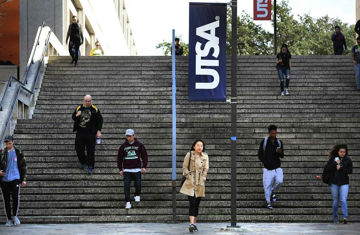 Students on their way to classes at the main UTSA campus in 2017. The university will get almost $30 million in federal pandemic relief funds, half of which must go to students.