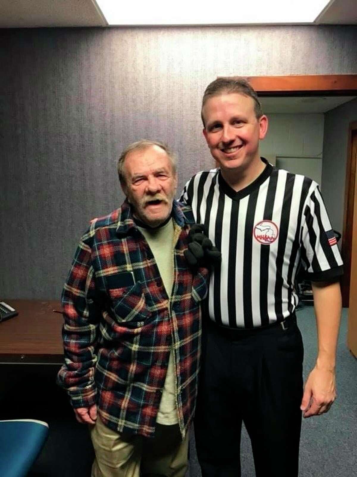 Baldwin's Matt Miller (right) is pictured with Terry Gibson, who got him into officiating, and now lives in Belding. (Courtesy photo)