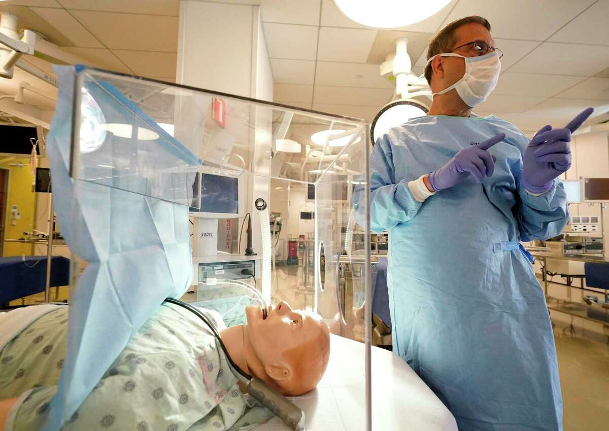 Doctors Treating Covid At Houston Methodist Get Inside Giant Plexiglass Boxes