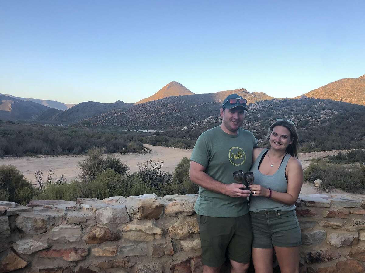 The author Jess Lander, with her husband Rick Reinell at Aquila Game Reserve in South Africa.