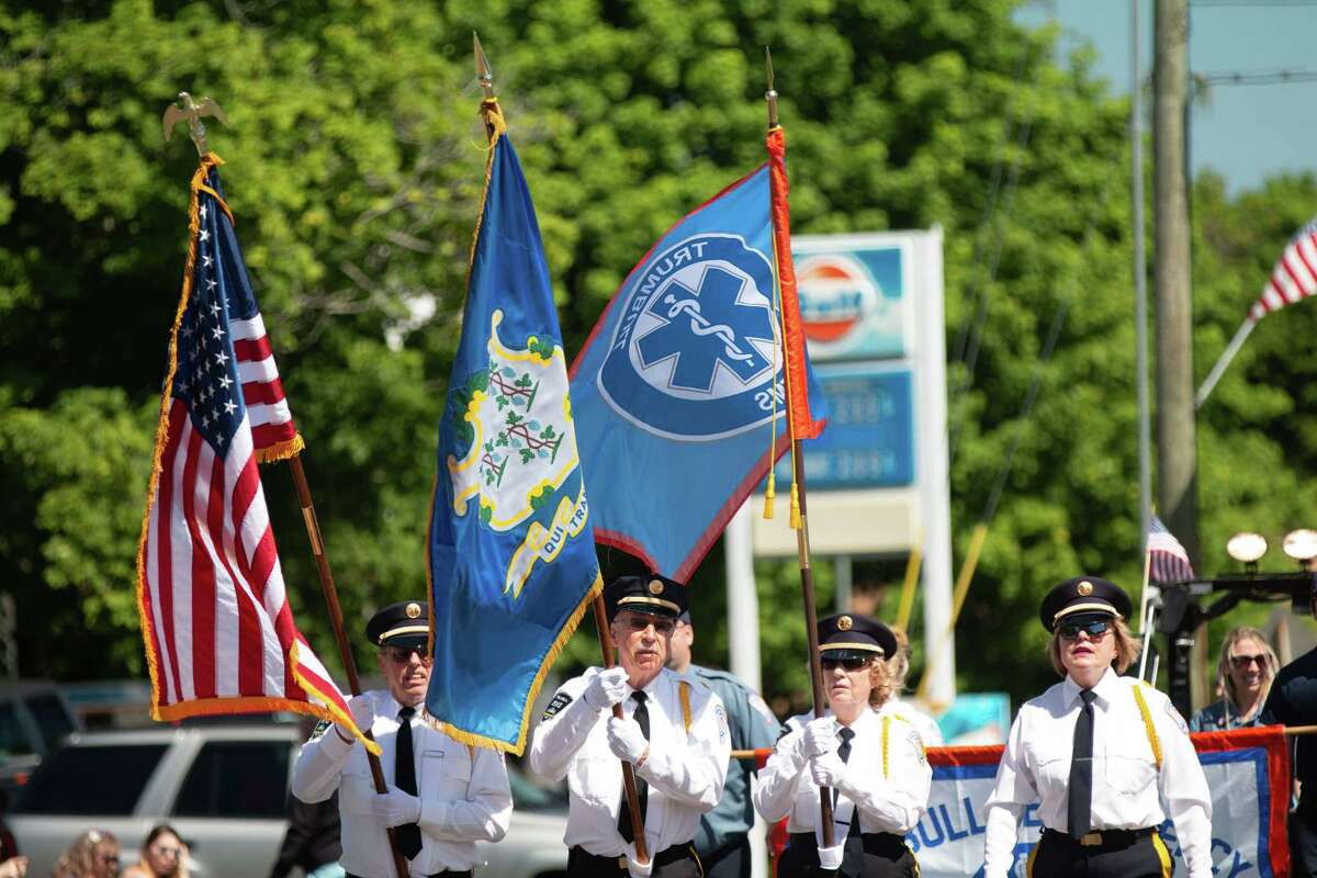 Trumbull emergency responders march up Main Street during Trumbull’s 2019 Memorial Day parade.