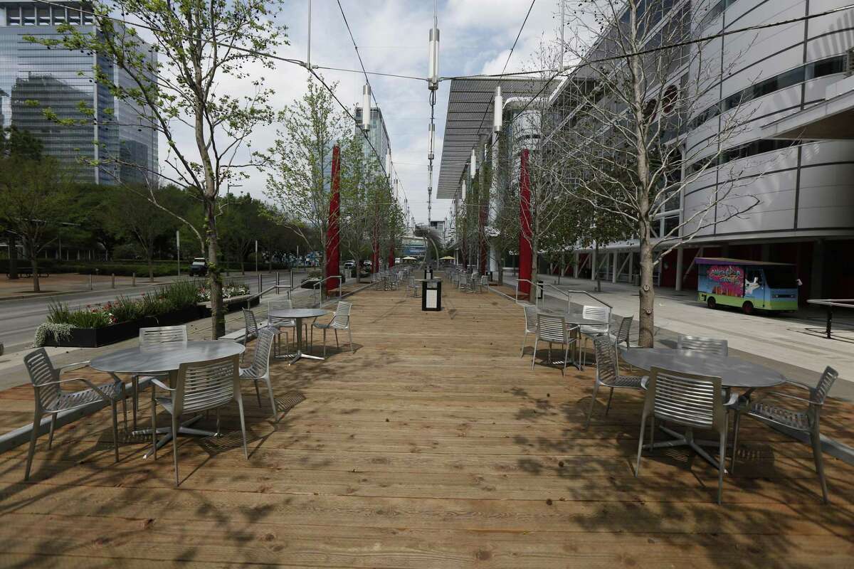 No one was at the George R. Brown Convention Center outdoor tables due to the coronavirus Tuesday, March 24, 2020, in Houston.