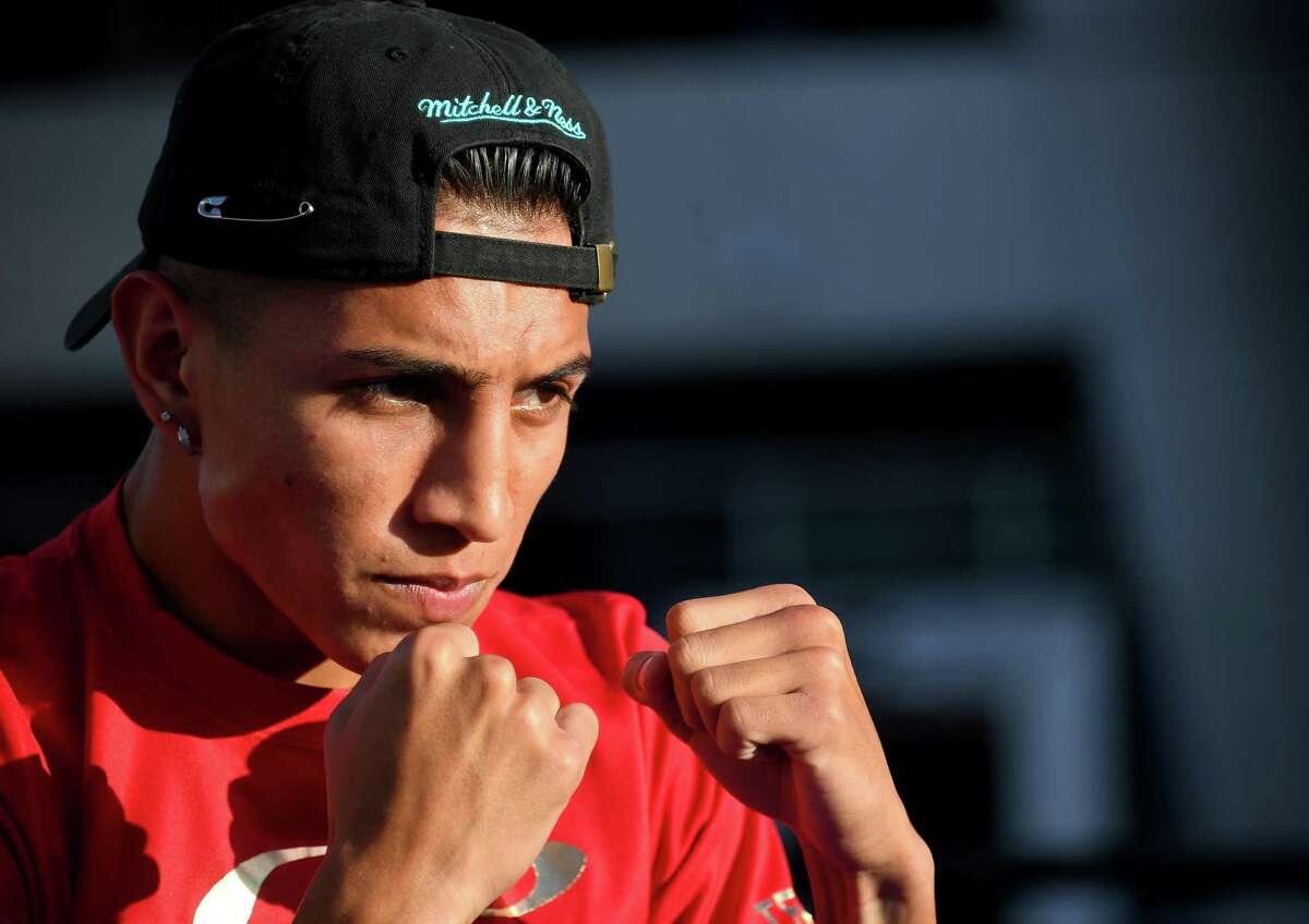 Fighter Mario Barrios shadow boxes in the ring during a media workout at LA Live on September 24, 2019 in Los Angeles, California.